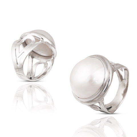 Two Mabe pearl rings with high polish silver finish, one with a smooth surface and one with a design wrapping around the finger.