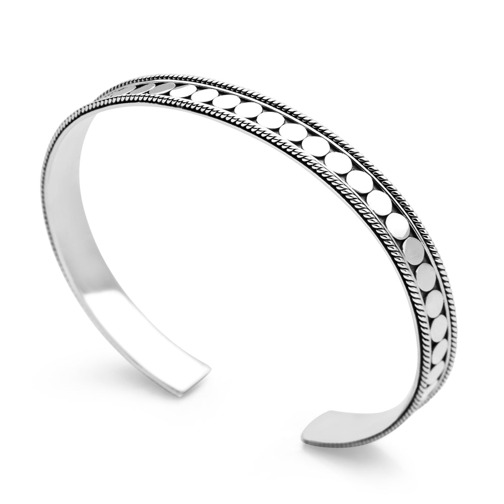 Silver bracelet with a patterned design on a white background. Men's and women's bangle - 925 sterling silver. 