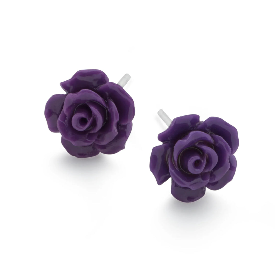Purple rose-shaped earrings on a white background