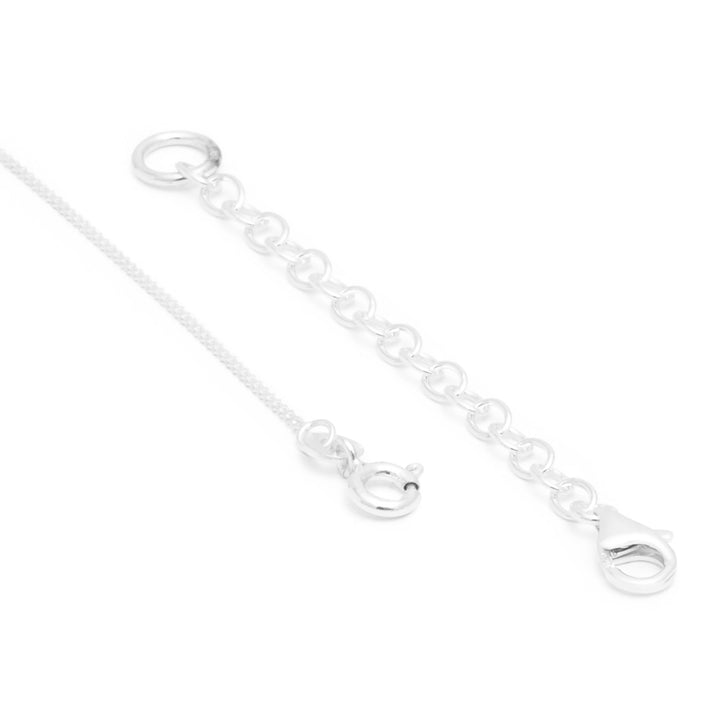 Silver necklace extension chain necklace on a white background