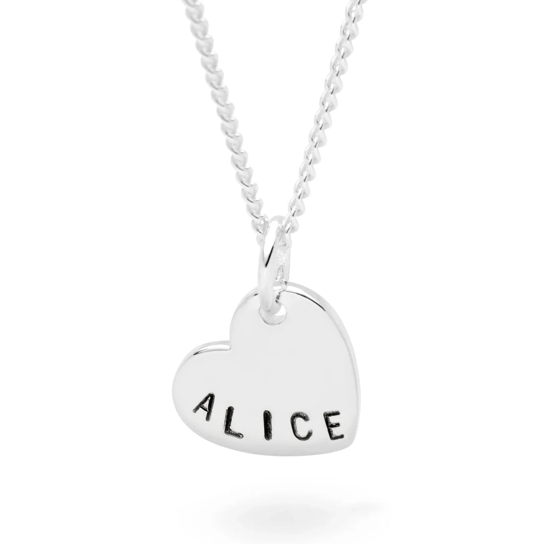Silver heart-shaped pendant with 'ALICE' engraved on a white background