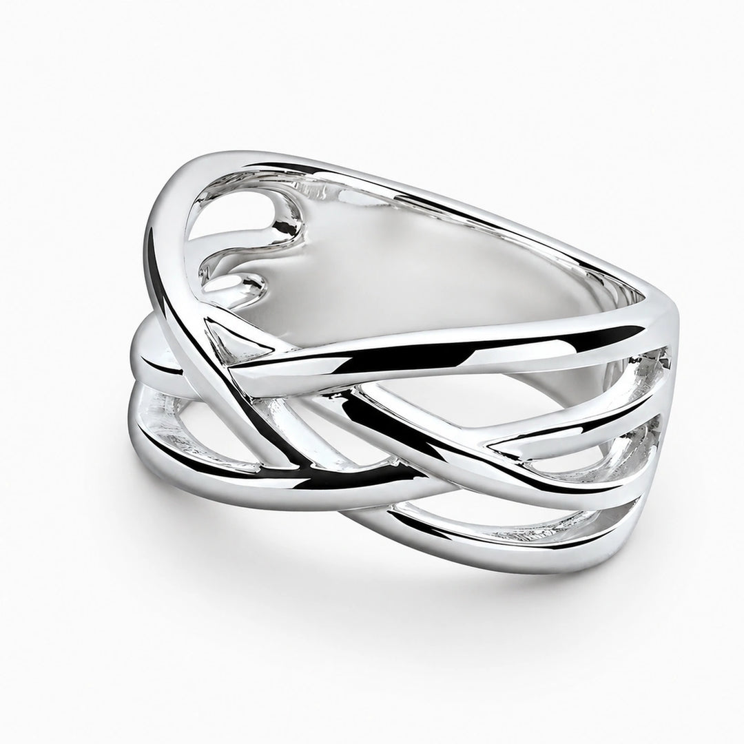 A wide sterling silver crossover ring with smooth, intertwined multi-strand lattice bands.