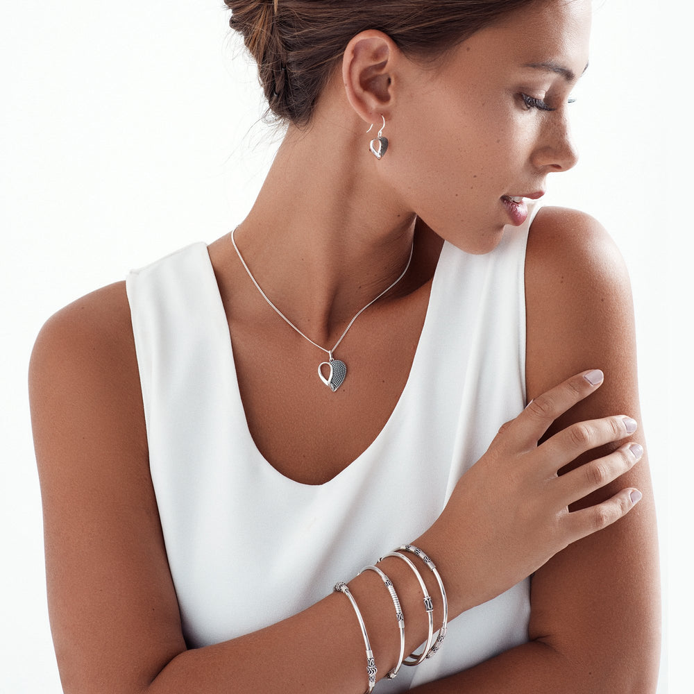 925 sterling silver artisan-crafted bangle on female model