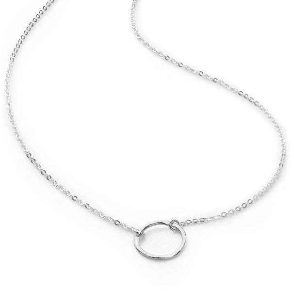 Hammered circle suspended on dainty chain necklace