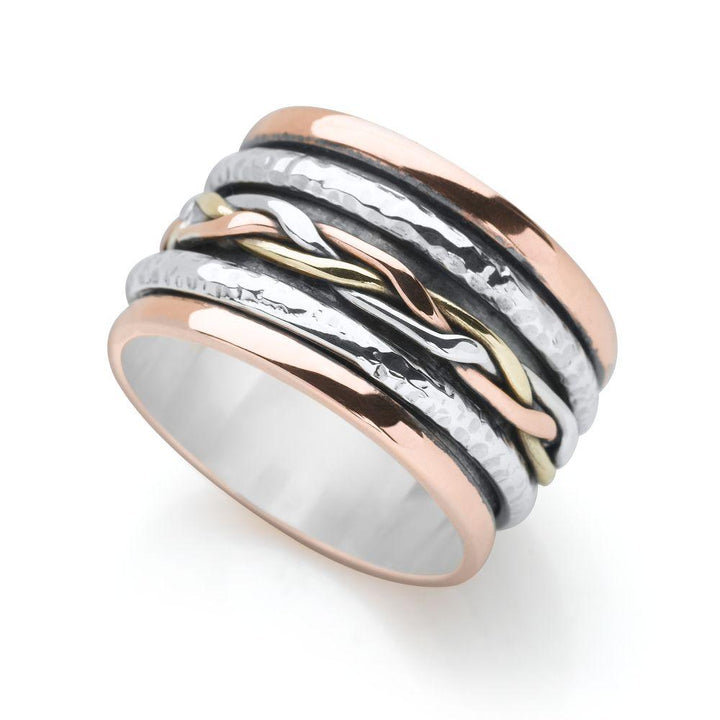 Sterling silver and copper and brass plated silver, wrapped and woven with a hammered finished spin ring