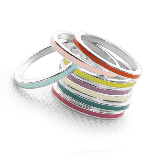 Stack of 925 sterling silver stack rings with coloured enamel middles.