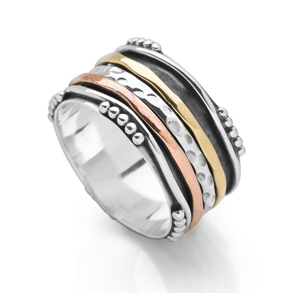 925 sterling silver spin ring with bands of copper, brass and silver with hammered and oxidised detailing